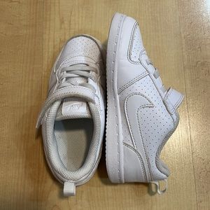 Gently used white Nike sneakers. Toddler size 10c.